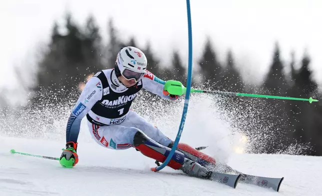 Norway's Henrik Kristoffersen competes in an alpine ski, men's slalom race, at the Lillehammer World Cup Finals, in Hafjell, Norway, Wednesday, March 25, 2026. (AP Photo/Marco Trovati)
