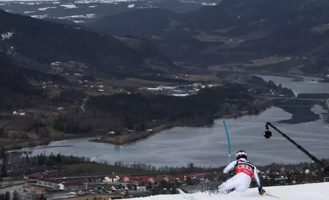 Norway's Atle Lie McGrath competes in an alpine ski, men's slalom race, at the Lillehammer World Cup Finals, in Hafjell, Norway, Wednesday, March 25, 2026. (AP Photo/Gabriele Facciotti)