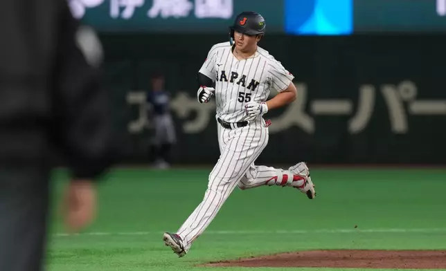Japan's Munetaka Murakami runs for his grand slam home run during the eighth inning of a World Baseball Classic game between Japan and the Czech Republic on Tuesday, March 10, 2026 in Tokyo. (AP Photo/Eugene Hoshiko)