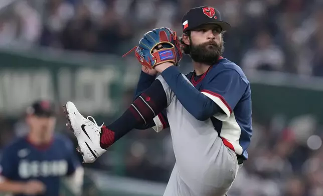Czech Republic's pitcher Ondrej Satoria pitches to a Japan batter during the inning of a World Baseball Classic game between Japan and the Czech Republic on Tuesday, March 10, 2026 in Tokyo. (AP Photo/Eugene Hoshiko)