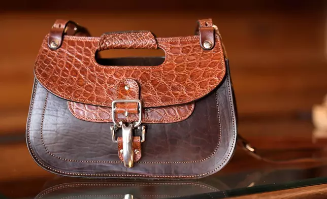 A No. 17 Hunt Bag made from American alligator is displayed at the Col. Littleton leather goods store Friday, March 6, 2026, in Lynnville, Tenn. (AP Photo/George Walker IV)
