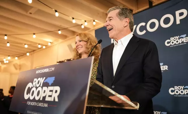 North Carolina Democratic Senate candidate former Gov. Roy Cooper speaks at a primary election night watch party Tuesday, March 3, 2026, in Raleigh, N.C. (AP Photo/Matt Ramey)