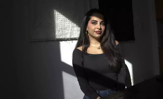 Ariana Afshar, one of many Iranian American content creators struggling to amplify the voices of Iranians amidst an internet blackout in Iran during the ongoing war, poses for a photo Monday, March 9, 2026, in New York. (AP Photo/Safiyah Riddle)