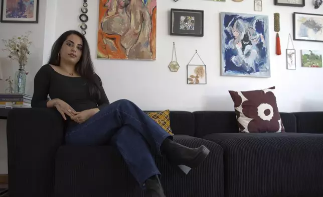 Ariana Afshar, one of many Iranian American content creators struggling to amplify the voices of Iranians amidst an internet blackout in Iran during the ongoing war, poses for a photo Monday, March 9, 2026, in New York. (AP Photo/Safiyah Riddle)