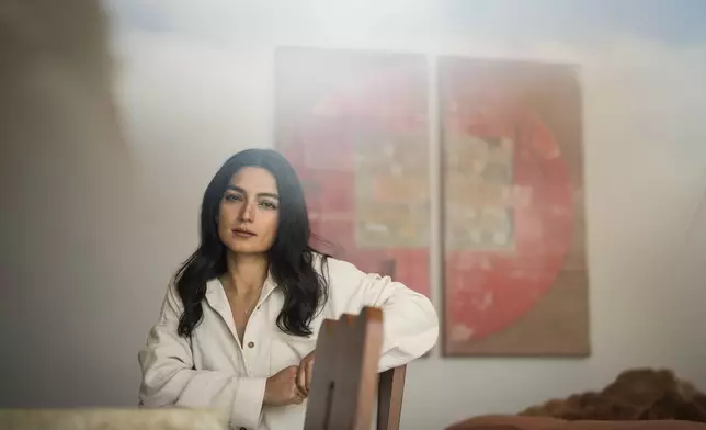 Zoya Biglary poses for photos in Los Angeles, Tuesday, March 10, 2026. (AP Photo/Jae C. Hong)