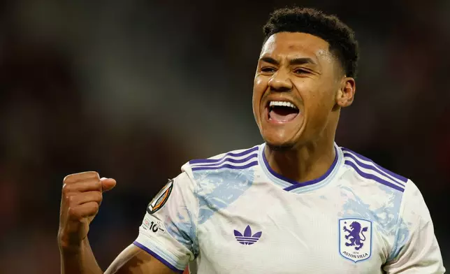 Aston Villa's Ollie Watkins celebrates after scoring during a first leg, round of 16 Europa League soccer match between Lille and Aston Villa in Lille, France, Sunday, Feb. 22, 2026. (AP Photo/Jean-Francois Badias)