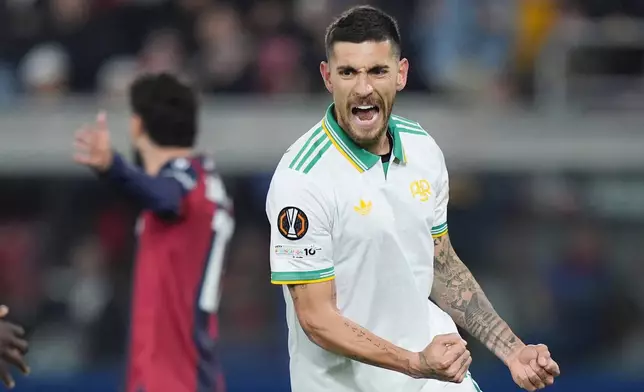 Roma's Lorenzo Pellegrini celebrates scoring their side's first goal of the game during the Europa League soccer match between Bologna and Roma in Bologna, Italy, Thursday, March 12, 2026. (Spada/LaPresse via AP)
