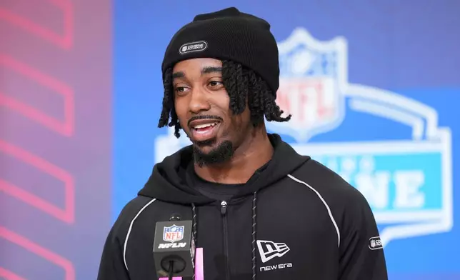 Indiana defensive back Louis Moore answers questions during a press conference at the NFL football scouting combine in Indianapolis, Thursday, Feb. 26, 2026. (AP Photo/Eric Gay)