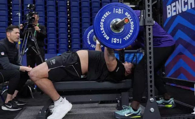 Arkansas offensive lineman Fernando Carmona lifts weights at the NFL football scouting combine in Indianapolis, Monday, March 2, 2026. (AP Photo/Eric Gay)