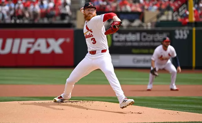 St. Louis Cardinals starting pitcher Dustin May (3) throws in the first inning of a baseball game against the Tampa Bay Rays on Sunday, March 29, 2026, in St. Louis. (AP Photo/Joe Puetz)