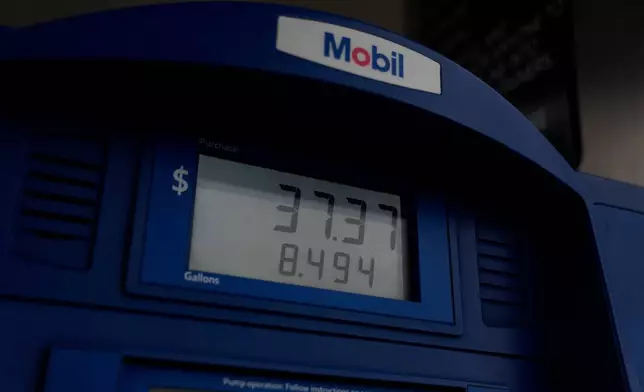 Gas prices are displayed at a station Wednesday, March 11, 2026, in Evanston Ill. (AP Photo/Erin Hooley)