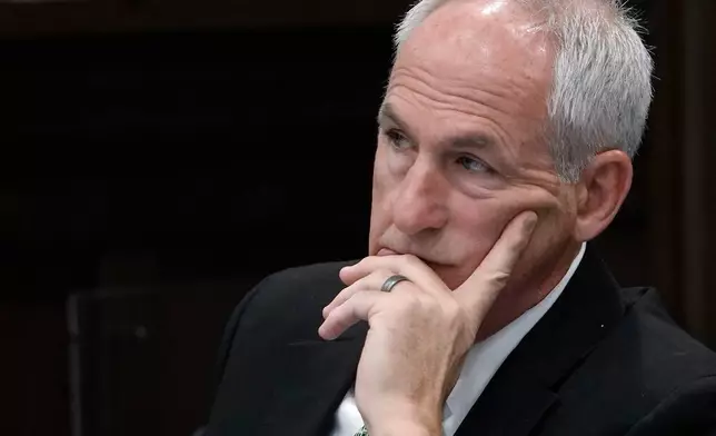 Ex-FirstEnergy Senior Vice President Michael Dowling listens to defense attorney Carole Rendon (not pictured) deliver her closing arguments in former FirstEnergy CEO Chuck Jones trial in Summit County Common Pleas Judge Susan Baker Ross's courtroom in Akron on Tuesday, March 17, 2026. (Mike Cardew/Akron Beacon Journal via AP, Pool)