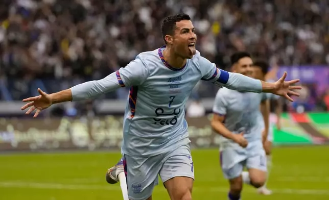 FILE - Al Nassr's Cristiano Ronaldo celebrates after scoring at the King Saud University Stadium, in Riyadh, Saudi Arabia, Jan. 19, 2023. (AP Photo/Hussein Malla, file)