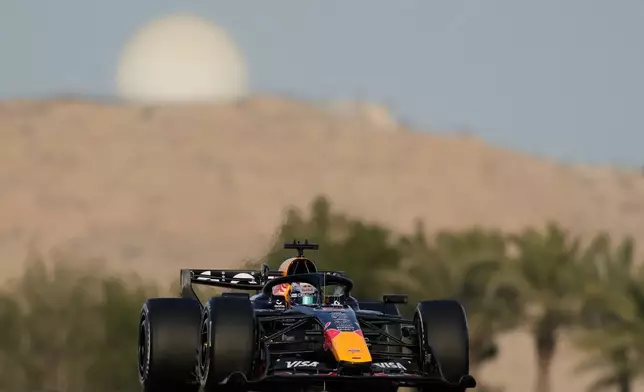 FILE - Red Bull driver Max Verstappen of the Netherlands steers his car during a Formula One pre-season test at the Bahrain International Circuit in Sakhir, Bahrain, Feb. 11, 2026. (AP Photo/Altaf Qadri, file)