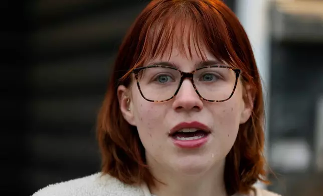 Keira Coady talks about her brother, Sgt. Declan Coady, 20, of West Des Moines, Iowa, outside her home, Tuesday, March 3, 2026, in West Des Moines, Iowa. (AP Photo/Charlie Neibergall)