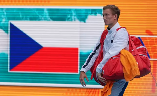 Jiri Lehecka of Czech Republic enters the court at the start of his men's singles final against Jannik Sinner of Italy, at the Miami Open tennis tournament, Sunday, March 29, 2026, in Miami Gardens, Fla. (AP Photo/Rebecca Blackwell)