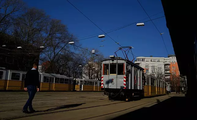 A century-old freight tram is parked in the Kelenfold tram depot in Budapest, Hungary on Thursday, March 12, 2026. (AP Photo/Bela Szandelszky)