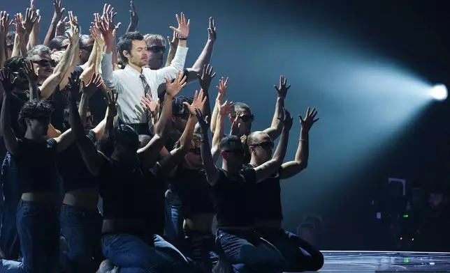 Harry Styles performs during the Brit Awards 2026 in Manchester, England, Saturday, Feb. 28, 2026. (Photo by Scott A Garfitt/Invision/AP)