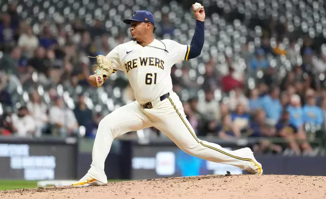 Milwaukee Brewers' Angel Zerpa pitches during the eighth inning of a baseball game against the Tampa Bay Rays, Monday, March 30, 2026, in Milwaukee. (AP Photo/Aaron Gash)
