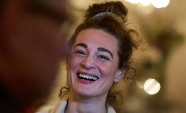 Neurobiologist Brankele Frank is interviewed before a session of the "singing circle" run by opera singer Maartje de Lint at the Concertgebouw concert hall in Amsterdam, on Feb. 24, 2026. (AP Photo/Peter Dejong)