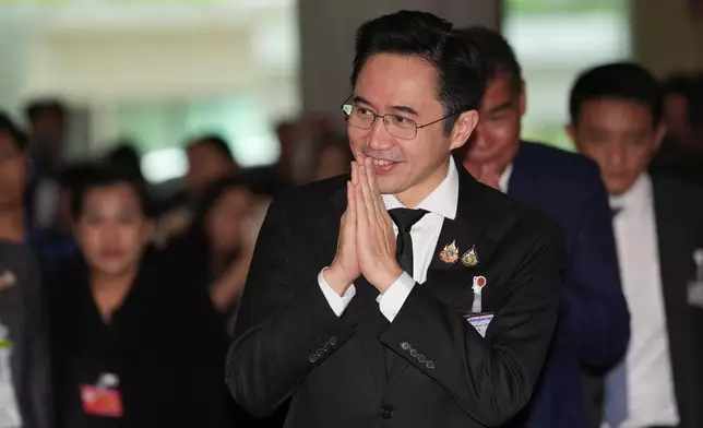 Yodchanun Wongsawat from Pheu Thai Party arrives at the parliament in Bangkok, Thailand, Thursday, March 19, 2026. (AP Photo/Sakchai Lalit)