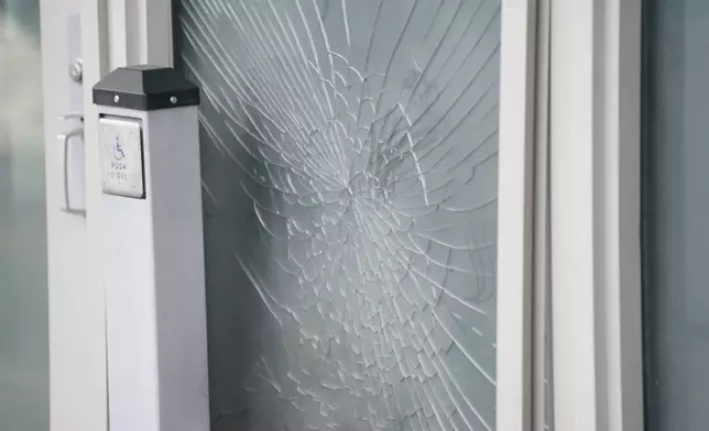 A view of a shattered door, at the U.S. Embassy in Oslo, Sunday, March 8, 2026. (Fredrik Varfjell /NTB Scanpix via AP)
