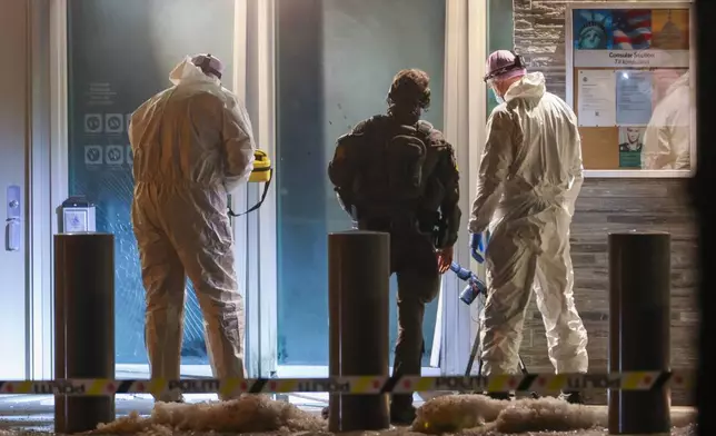 Norwegian police and technicians attend at the U.S. Embassy in Oslo, Norway Sunday, March 8, 2026. (Hans O. Torgersen /NTB Scanpix via AP)