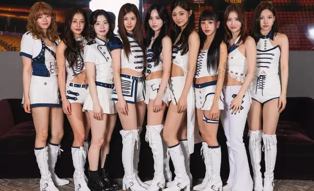 Members of TWICE, from left, Jeongyeon, Jihyo, Dahyun, Sana, Mina, Tzuyu, Chaeyoung, Momo, and Nayeon pose for a portrait on Wednesday, Jan. 21, 2026, in Inglewood, Calif. (Photo by Andrew Park/Invision/AP)