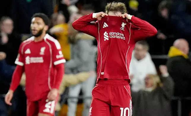 Liverpool's Alexis Mac Allister reacts after the team conceded a second goal against Wolverhampton Wanderers during an English Premier League match, Tuesday, March 3, 2026, in Wolverhampton, England. (Jacob King/PA via AP)