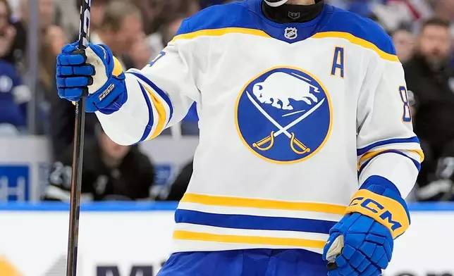 Buffalo Sabres right wing Alex Tuch (89) celebrates after scoring against the Tampa Bay Lightning during the third period of an NHL hockey game Saturday, Feb. 28, 2026, in Tampa, Fla. (AP Photo/Chris O'Meara)
