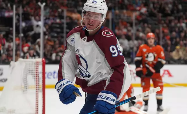 Colorado Avalanche left wing Victor Olofsson celebrates a goal by teammate center Parker Kelly during the second period of an NHL hockey game against the Anaheim Ducks Tuesday, March 3, 2026, in Anaheim, Calif. (AP Photo/Gregory Bull)