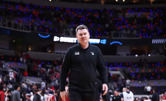 Arizona head coach Tommy Lloyd walks off the court after a win over Arkansas in the Sweet 16 of the NCAA college basketball tournament, Thursday, March 26, 2026, in San Jose, Calif. (AP Photo/Kelley L Cox)
