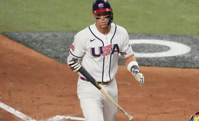 United States Aaron Judge gestures after striking out during the fourth inning in the championship game of the World Baseball Classic against Venezuela, Tuesday, March 17, 2026, in Miami. (AP Photo/Lynne Sladky)