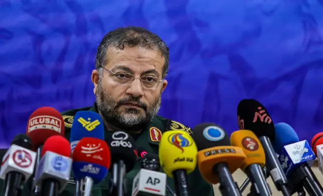 FILE - Commander of Iran's Basij paramilitary force, Gen. Gholam Reza Soleimani, gives a press conference in Tehran, Iran, Nov. 18, 2019. (AP Photo/Ebrahim Noroozi, File)