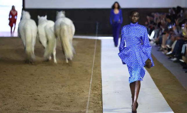A model wears a creation from the Stella McCartney Fall/Winter 2026-2027 Women's collection presented in Paris, Wednesday, March 4, 2026. (AP Photo/Tom Nicholson)