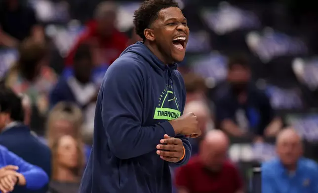 Minnesota Timberwolves guard Anthony Edwards (5) warms up before an NBA basketball game against the Dallas Mavericks Monday, March 30, 2026, in Dallas. (AP Photo/Gareth Patterson)