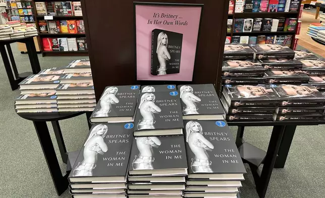 FILE - Britney Spears' memoir "The Woman in Me" is seen at a Barnes &amp; Noble bookstore, in Clifton, N.J., on Nov. 2, 2023. (AP Photo/Ted Shaffrey, File)