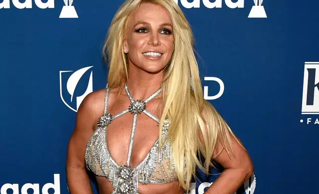 FILE - Britney Spears arrives at the 29th annual GLAAD Media Awards, April 12, 2018, in Beverly Hills, Calif. (Photo by Chris Pizzello/Invision/AP, File)