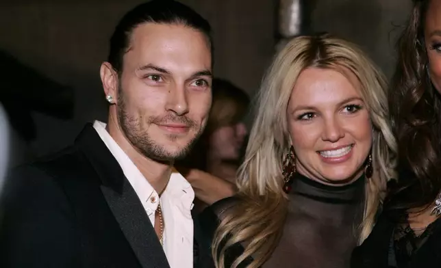 FILE - Britney Spears, right, and her husband Kevin Federline arrive for a post Grammy party, in Beverly Hills, Calif., on Feb. 8, 2006. (AP Photo/Danny Moloshok, File)