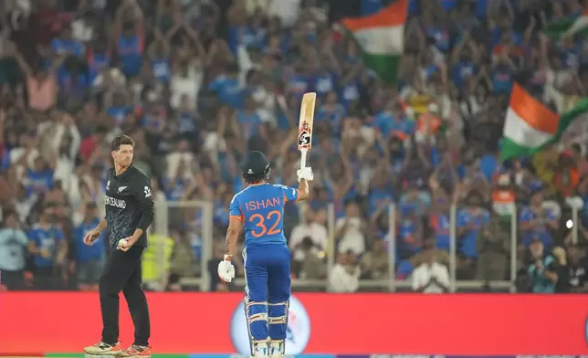 India's Ishan Kishan celebrates his fifty runs during the T20 World Cup cricket final match between India and New Zealand in Ahmedabad, India, Sunday, March 8, 2026. (AP Photo/Rafiq Maqbool)