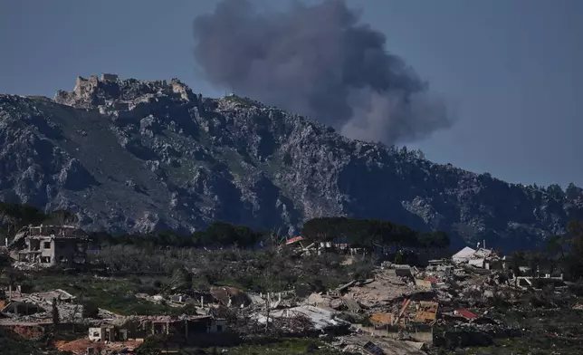 Smoke rises following Israeli bombardment in southern Lebanon as seen from northern Israel, Thursday, March 5, 2026. (AP Photo/Ariel Schalit)