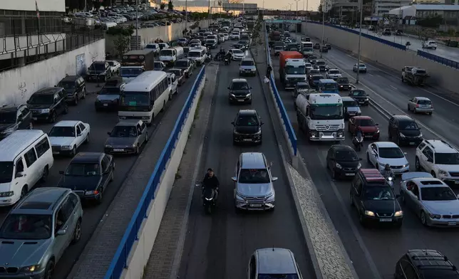 Cars sit in traffic on a highway as residents flee Israeli airstrikes in Dahiyeh, Beirut's southern suburbs, Lebanon, Thursday, March 5, 2026. (AP Photo/Bilal Hussein)