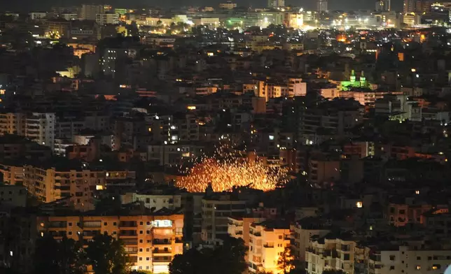 Flames rise following an Israeli airstrike in Dahiyeh, Beirut's southern suburbs, Lebanon, Thursday, March 5, 2026. (AP Photo/Hassan Ammar)