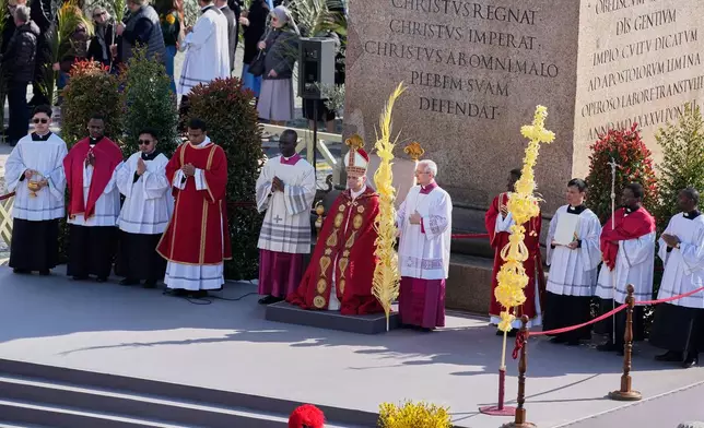 Pope Leo XIV presides over Mass in St. Peter's Square at the Vatican on the Catholic feast of Palm Sunday, commemorating Jesus' arrival in Jerusalem, Sunday, March 29, 2026. (AP Photo/Alessandra Tarantino)