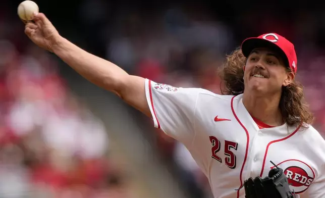Cincinnati Reds pitcher Rhett Lowder throws during the first inning of a baseball game between the Cincinnati Reds and the Boston Red Sox in Cincinnati, Sunday, March 29, 2026. (AP Photo/Carolyn Kaster)