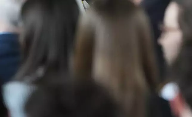 Ginette Kolinka, a 101-year-old survivor of Auschwitz, during a meeting with pupils in a Paris-region high school in Saint-Maur-des-Fosses, outside Paris, France, March 21, 2026. (AP Photo/Thibault Camus)