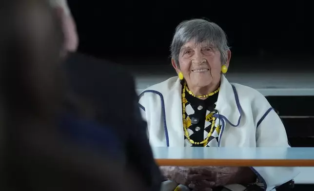 Ginette Kolinka, a 101-year-old survivor of Auschwitz, during a meeting with pupils in a Paris-region high school in Saint-Maur-des-Fosses, outside Paris, France, March 21, 2026. (AP Photo/Thibault Camus)