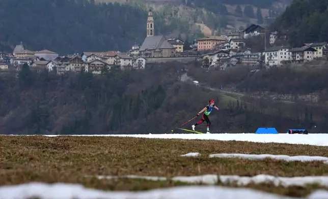 Brittany Hudak, of Canada, competes in the cross country skiing women's 10Km interval start classic standing final at the 2026 Winter Paralympics, in Tesero, Italy, Wednesday, March 11, 2026. (AP Photo/Evgeniy Maloletka)