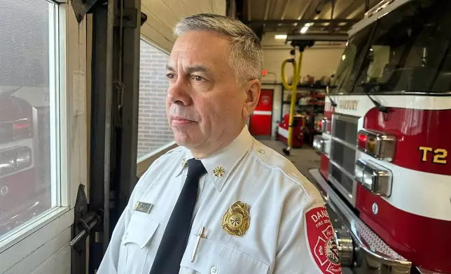 Danbury Assistant Fire Chief William Lounsbury poses for a photo, Sunday, Jan. 22, 2026, at the Danbury Fire Department, in Danbury, Conn. (AP Photo/Dave Collins)