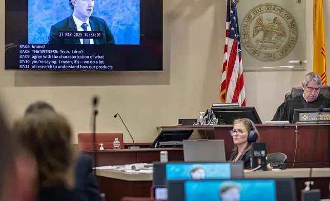 A recording of Meta Founder and CEO Mark Zuckerberg's deposition is played for the jurors on Wednesday, March 4, 2026, in Santa Fe, N.M. (Jim Weber/Santa Fe New Mexican via AP, Pool)